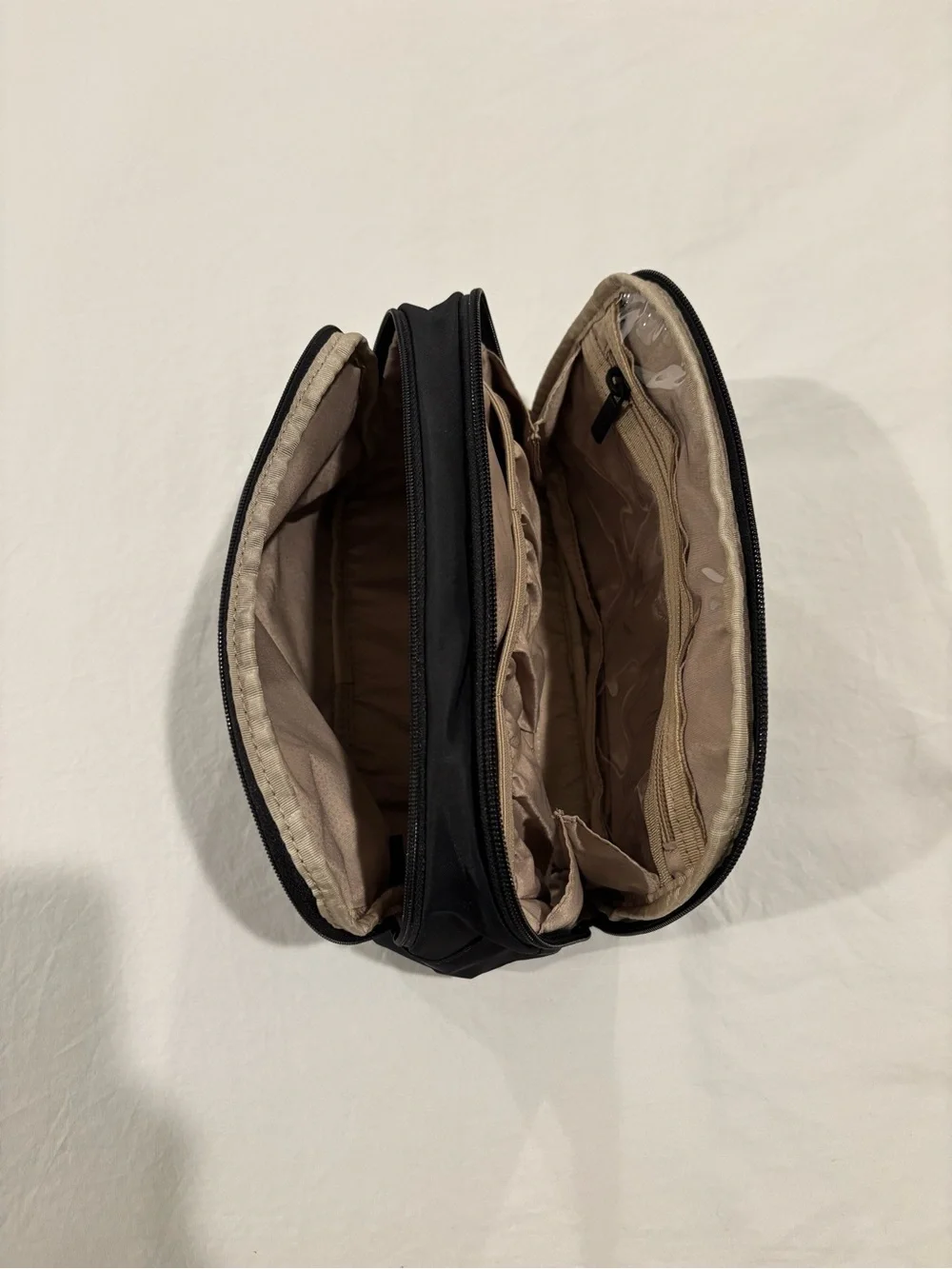 Tumi Black Cosmetic Pouch with Gold Accent